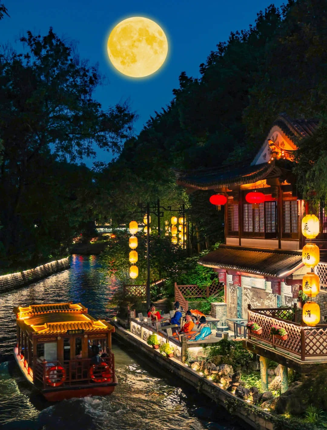 Confucius Temple night view with boats and moon