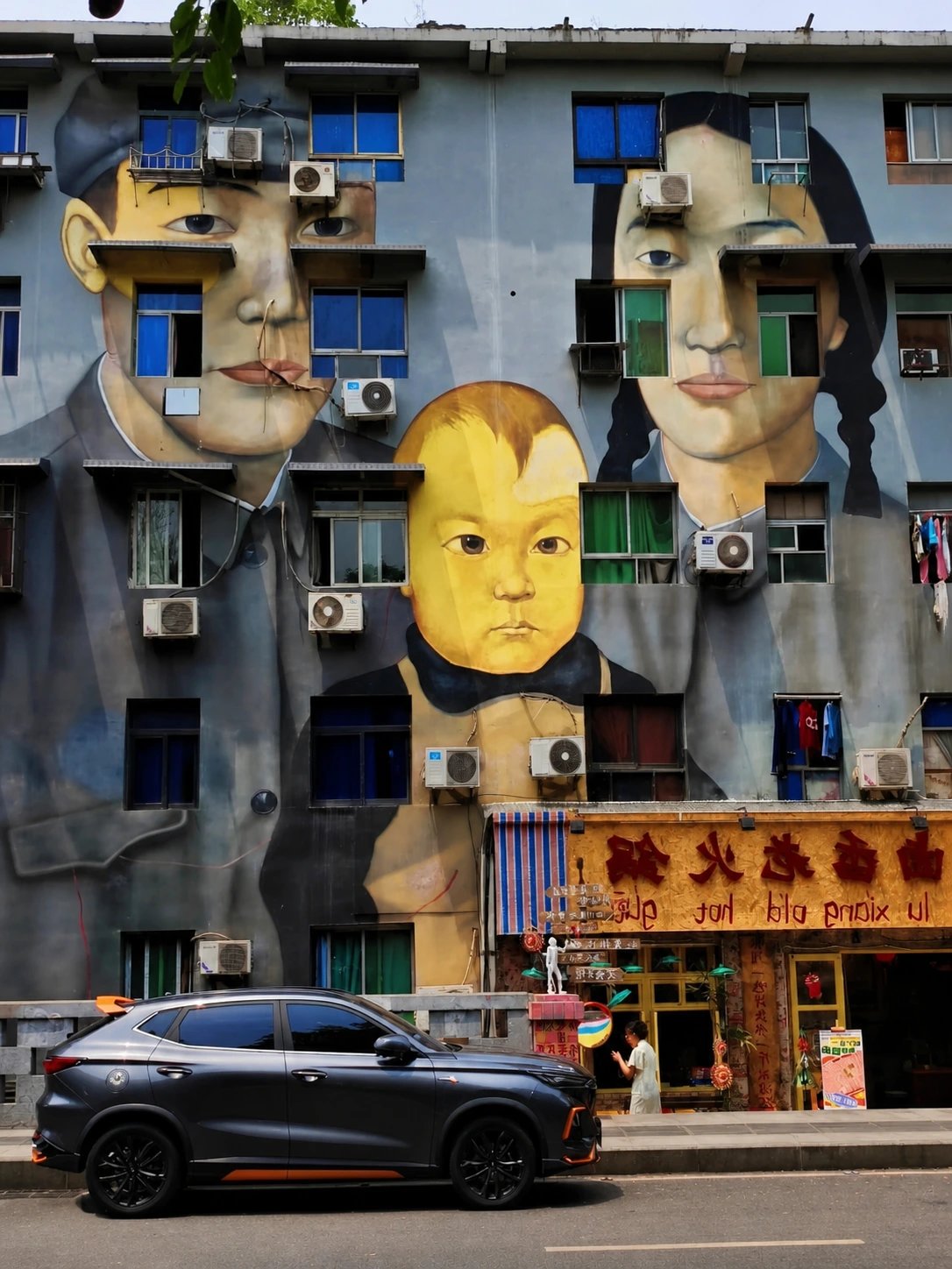 Artistic building murals at Huangjueping Graffiti Street