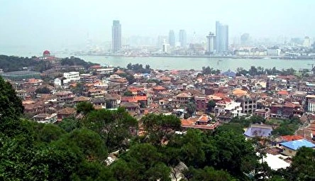 Gulangyu's layered roofs and subtropical island landscape
