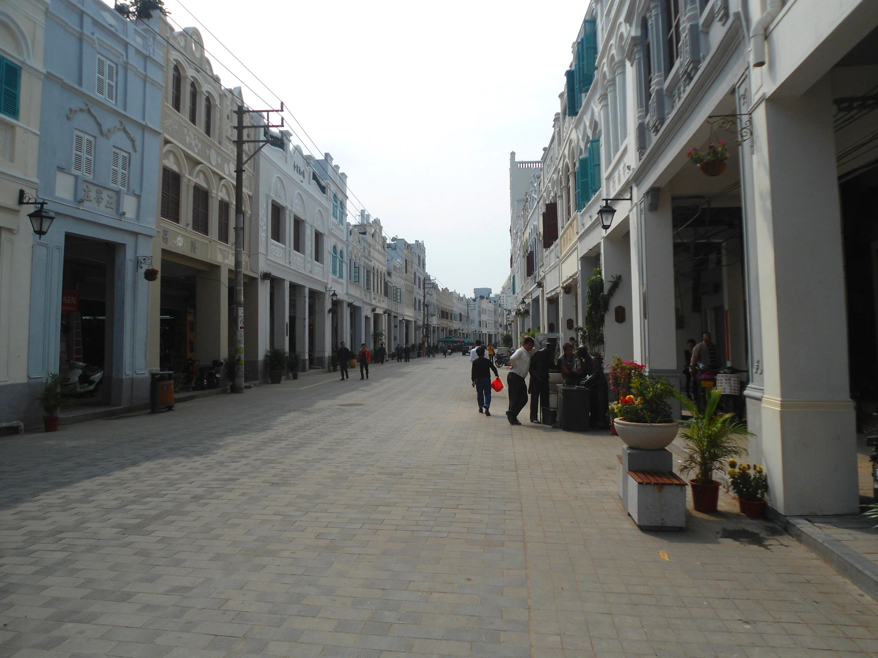 Long perspective through Haikou's restored arcade street