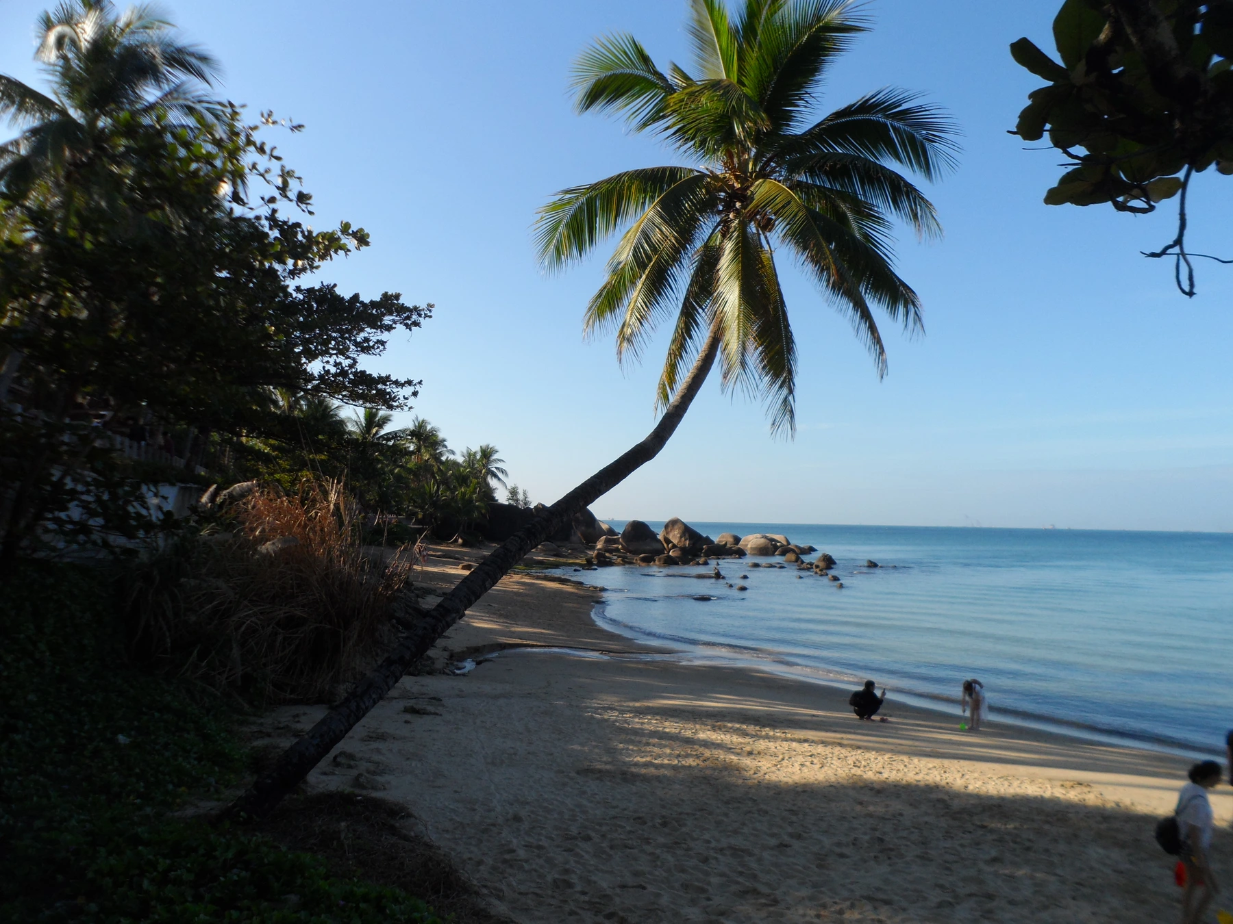 Large inscribed granite boulder on the sandy Tianya Haijiao coast