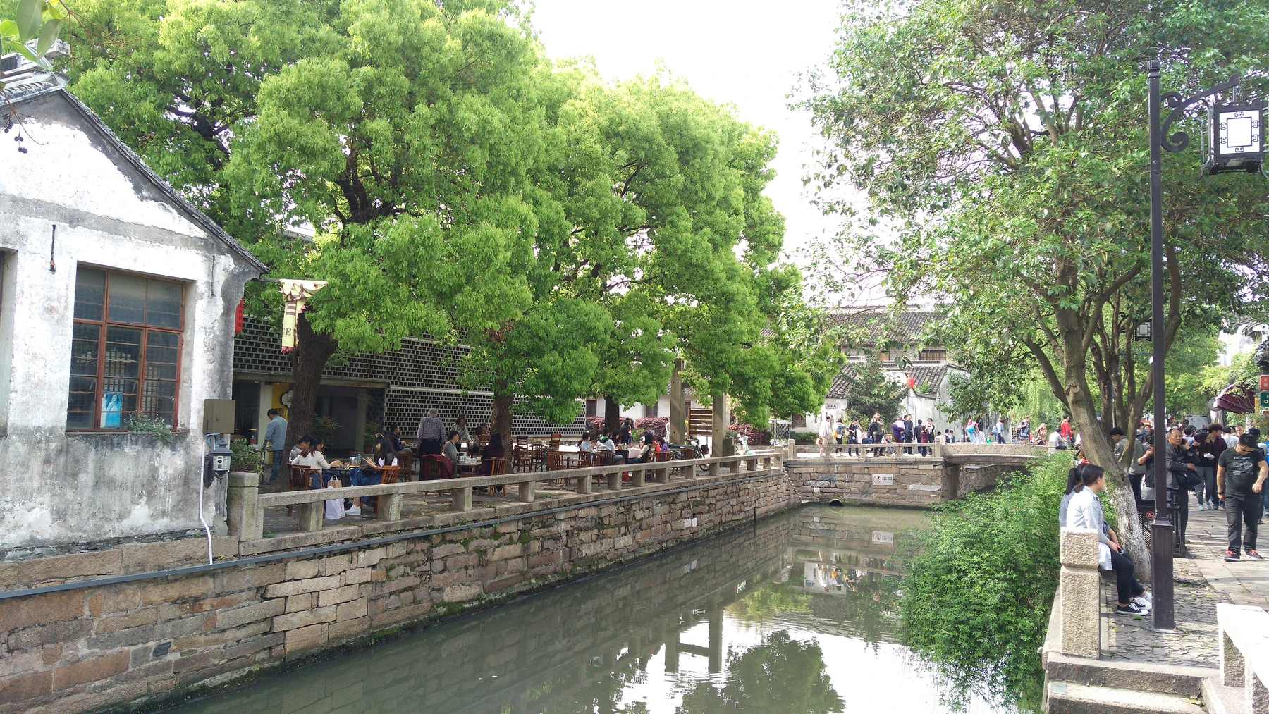 Residential canal and stone embankment along Pingjiang Road in Suzhou