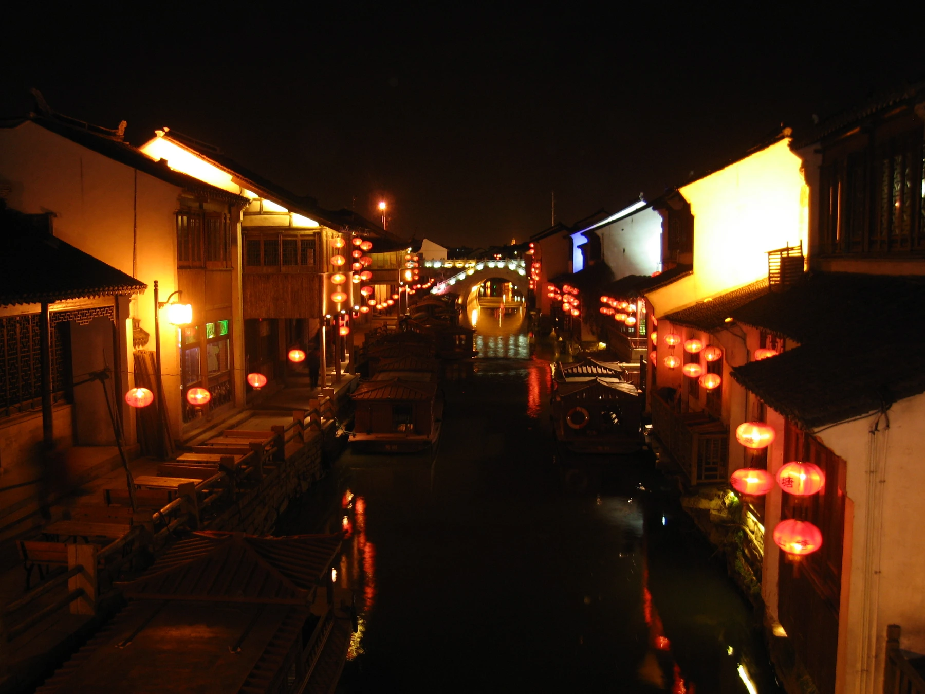 Warm evening lights reflected along Shantang Canal