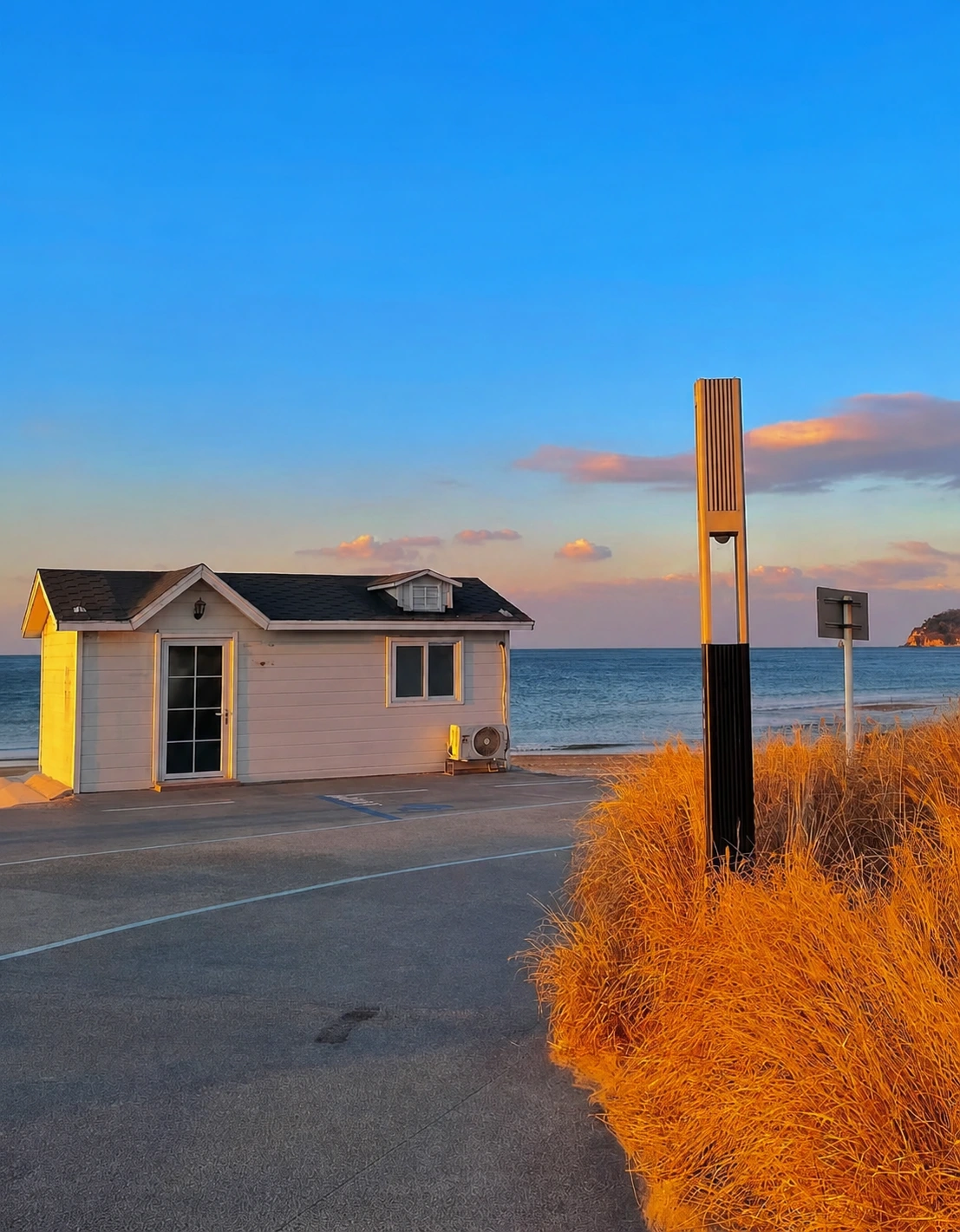 Sunset and houses at Shilaoren Beach