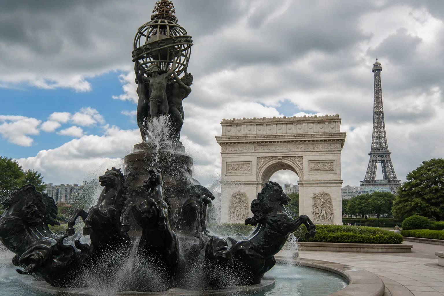 View of the Arc de Triomphe, sculptural fountain and Eiffel Tower replicas