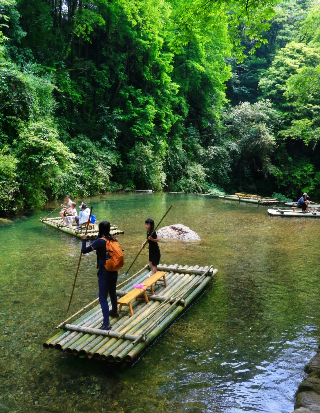 Traditional bamboo rafting on the mountain's waters