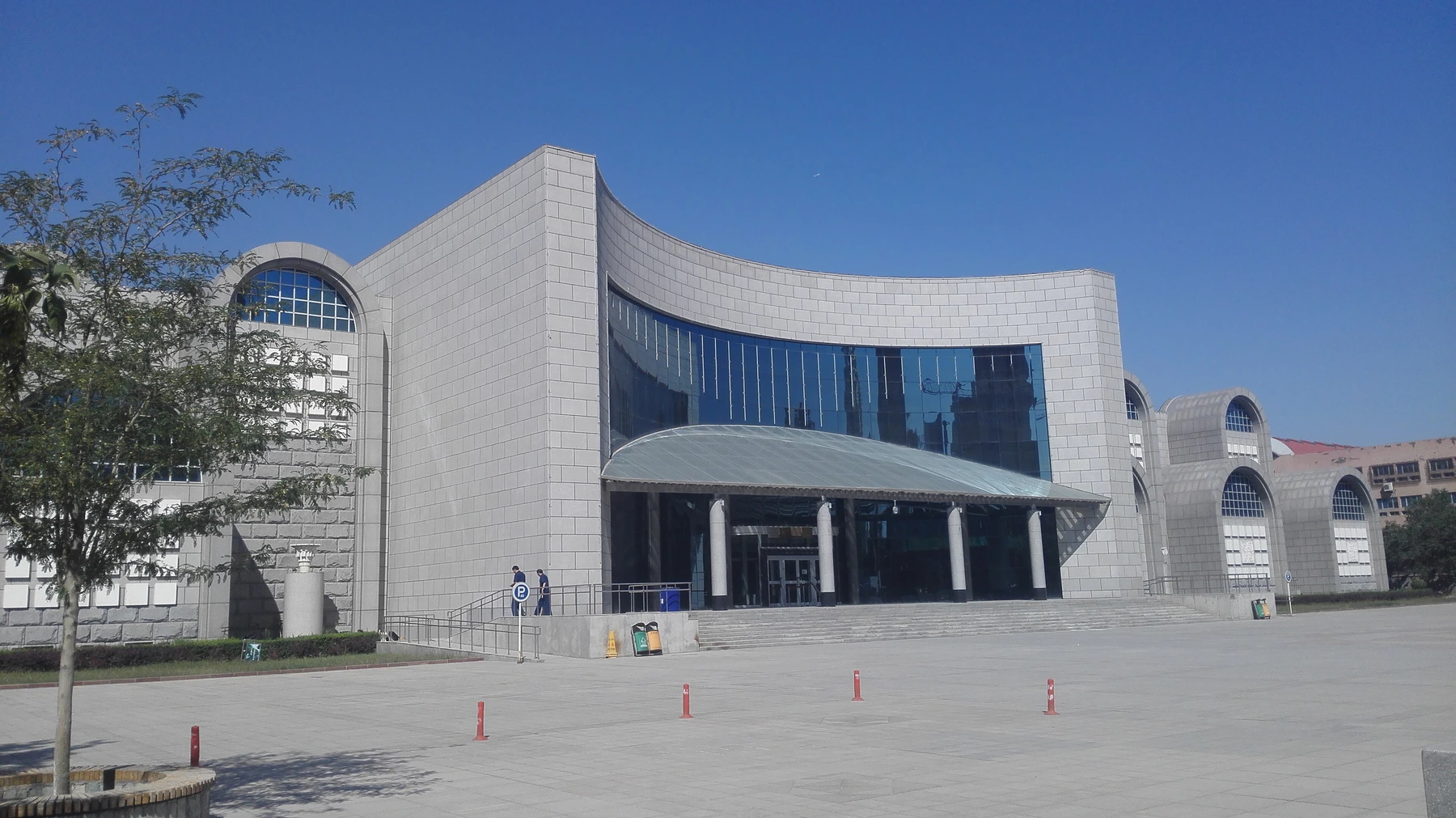 Curved modern facade and entrance of the Xinjiang Regional Museum
