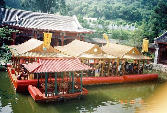 Lake, pavilion and white balustrade in the reconstructed Zhuhai park