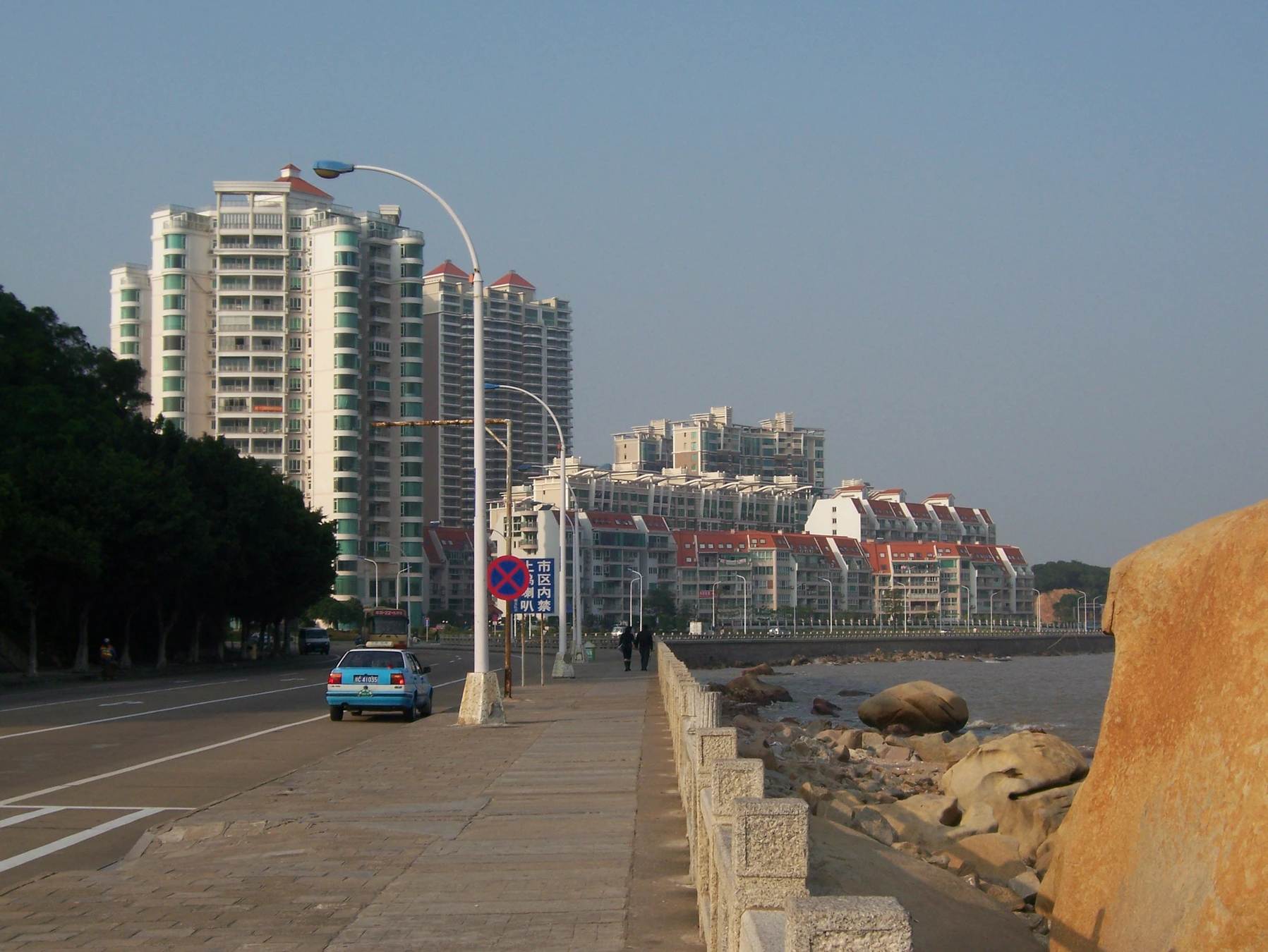 Zhuhai waterfront promenade and modern coastal buildings