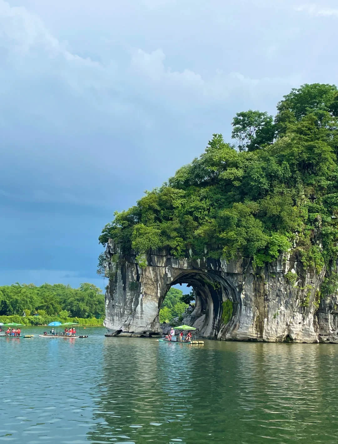 Elephant Trunk Hill with traditional boats on the Li River