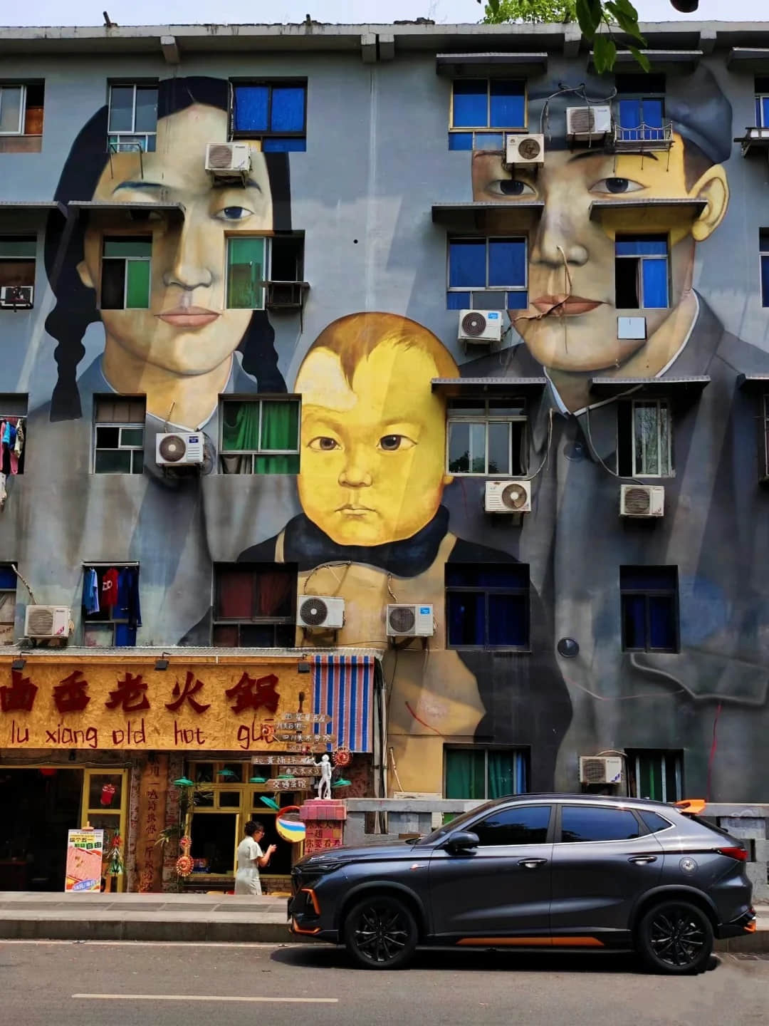 Artistic building murals at Huangjueping Graffiti Street