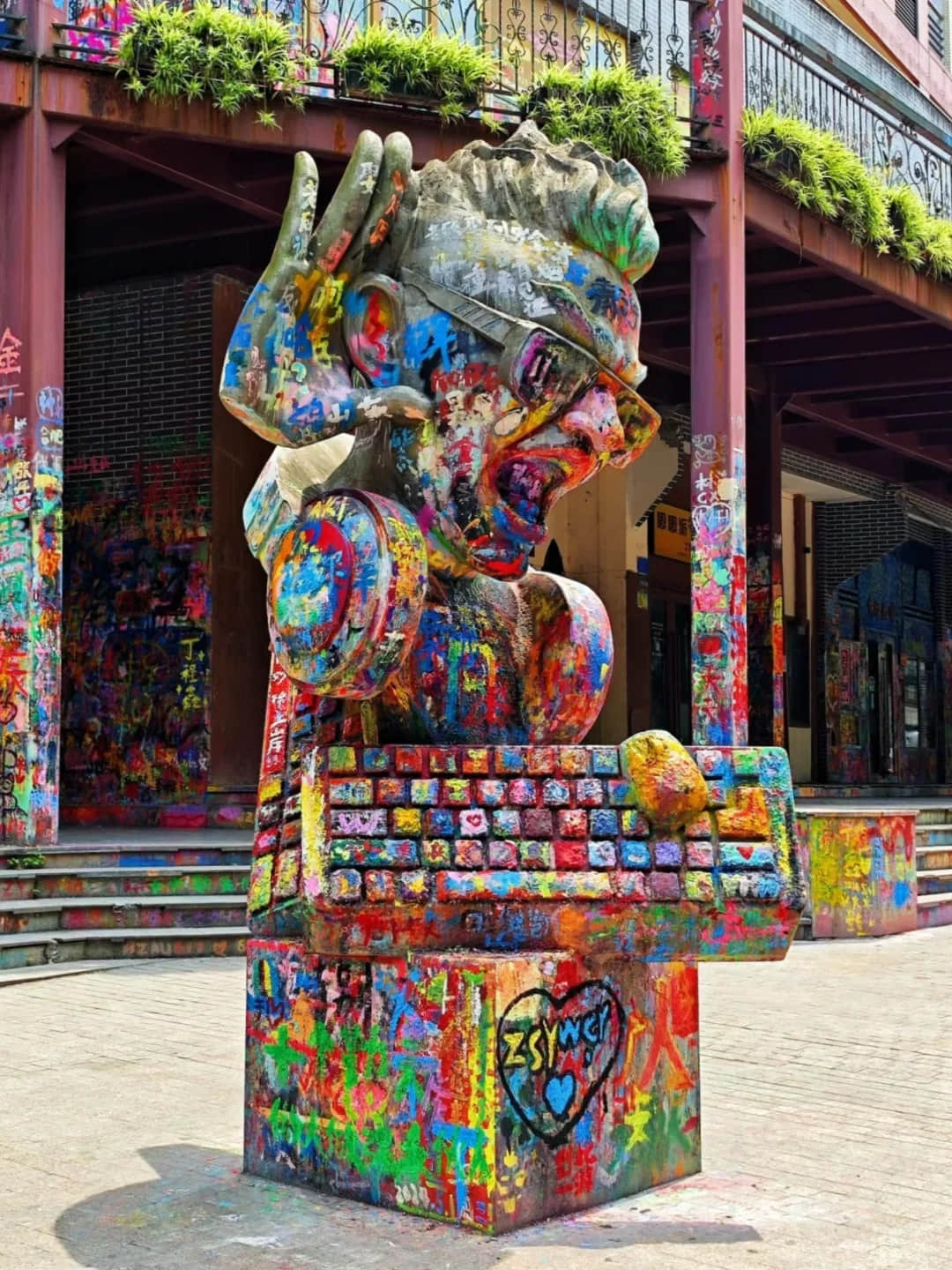 Sculptural graffiti at Huangjueping Graffiti Street