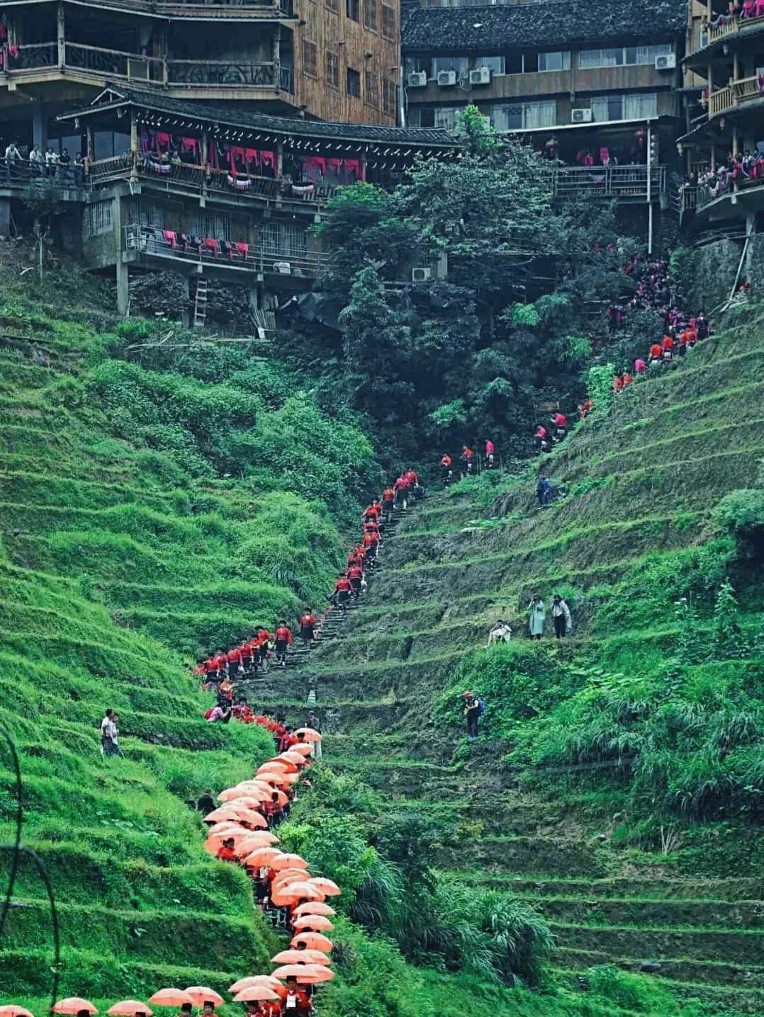 Traditional houses and mountains of Huangluo Red Yao Village