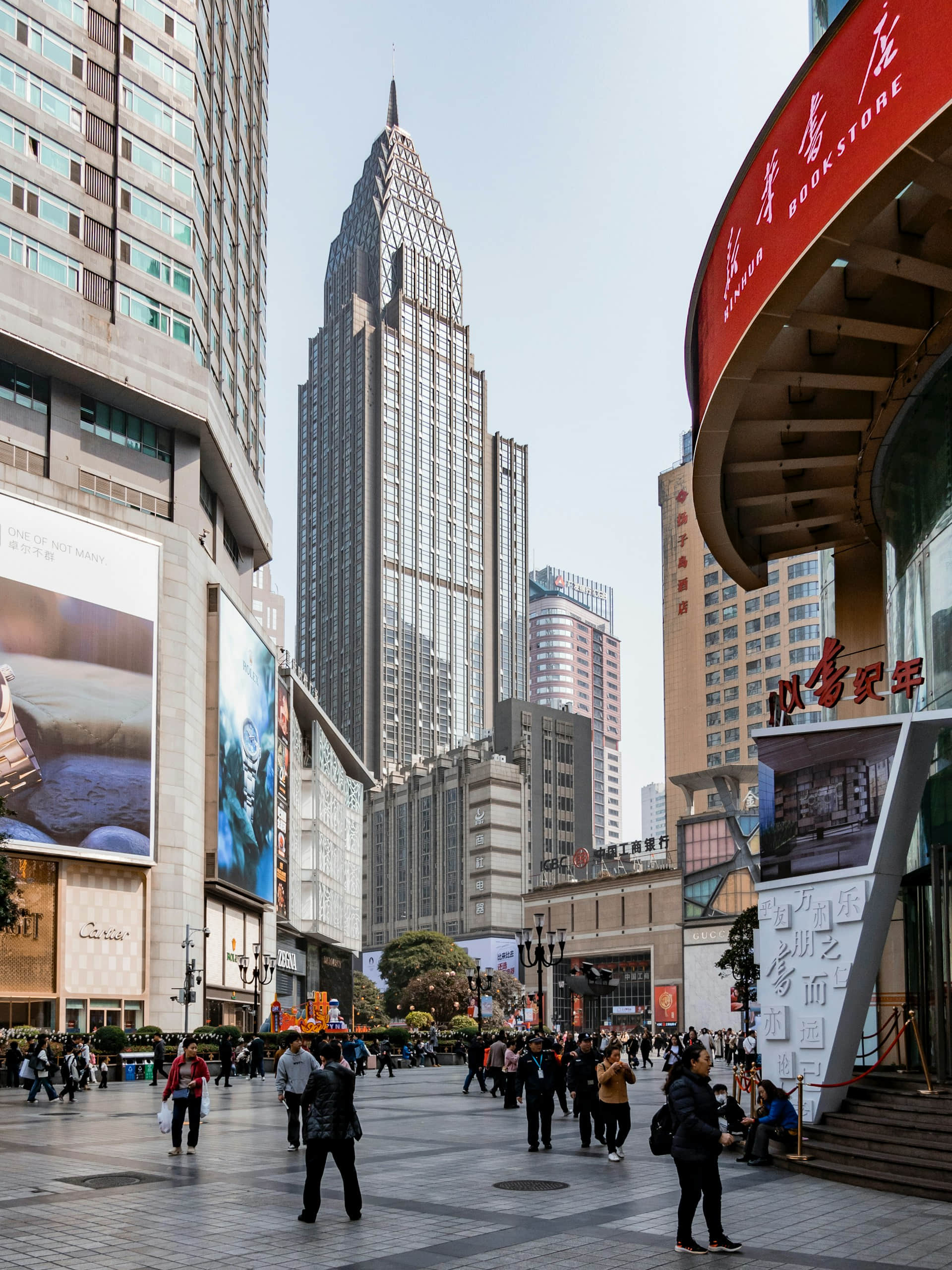 Interior view of Jiefangbei Pedestrian Street showing pedestrians and commercial areas