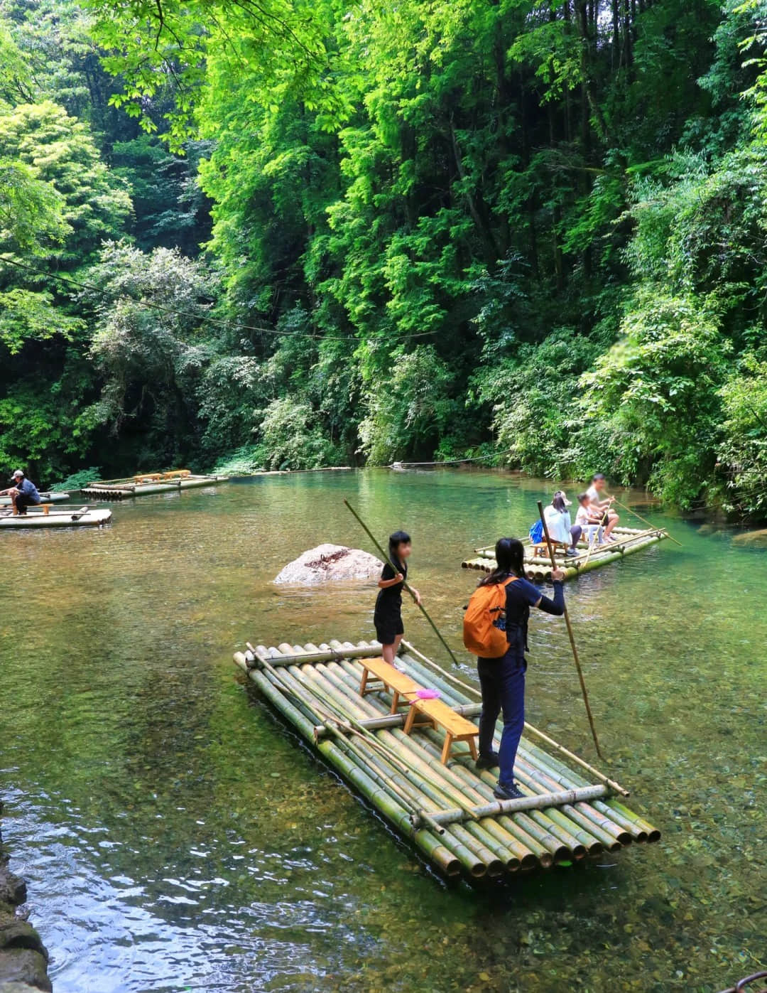 Traditional bamboo rafting on the mountain's waters