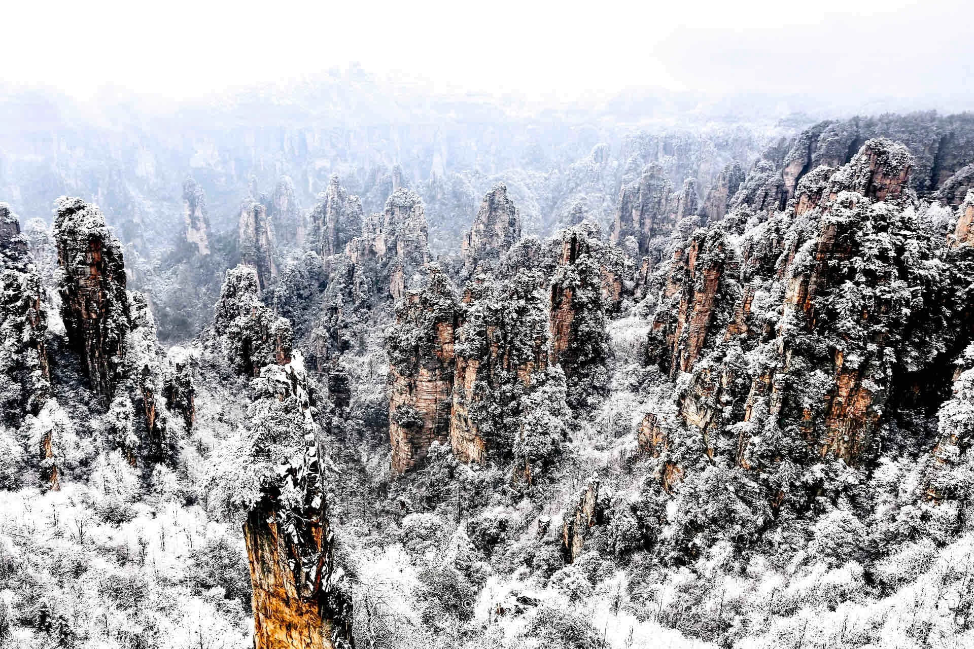 Snow-covered mountains in Yuanjiajie during winter